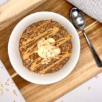 image of high protein overnight oats in bowl with spoon